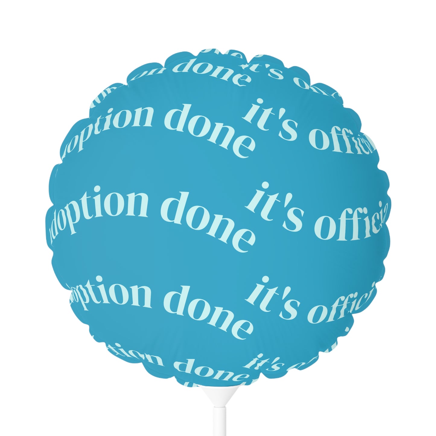 Blue balloon with white text 'adoption done' and 'it's official' on a white background