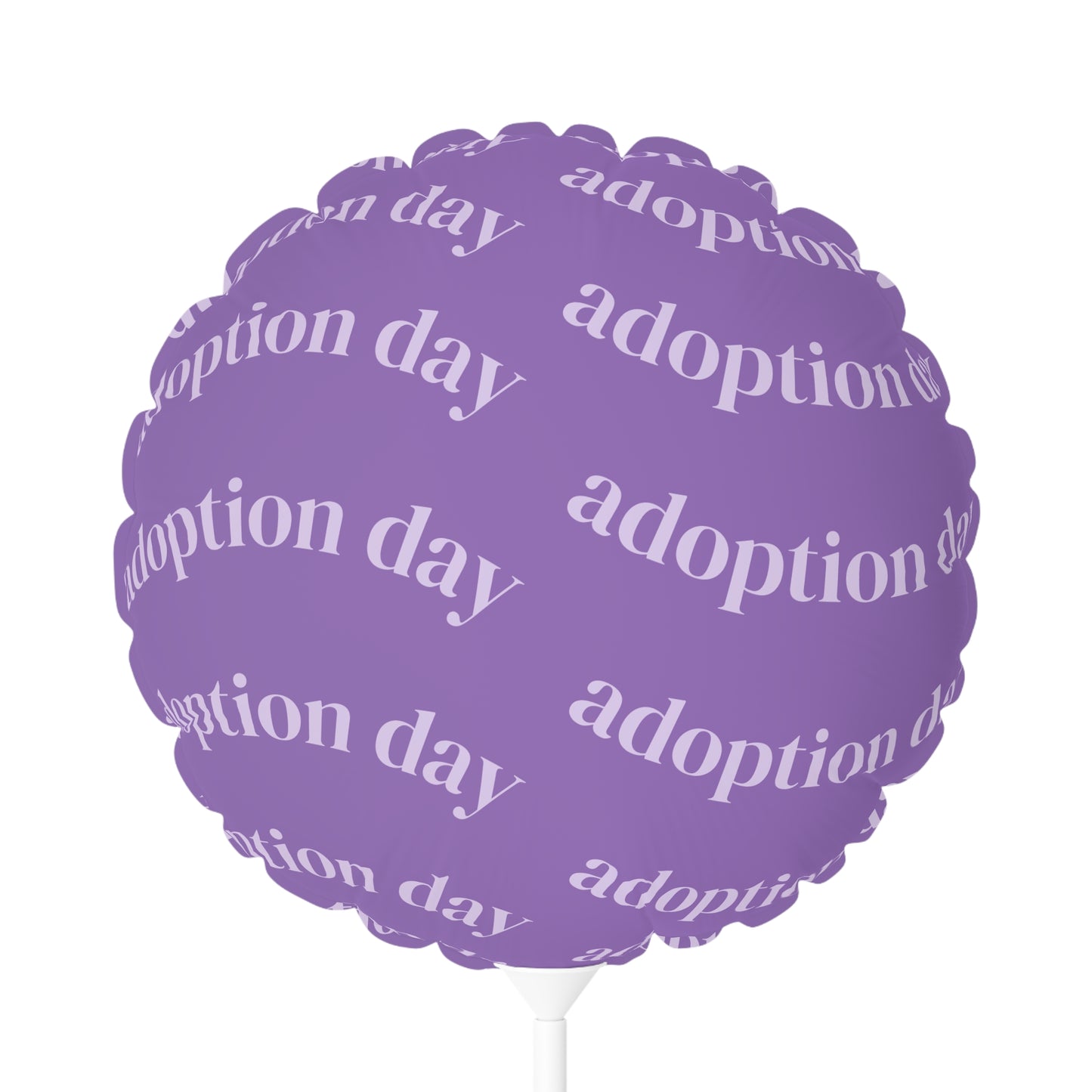 Purple balloon with 'adoption day' text on a white background