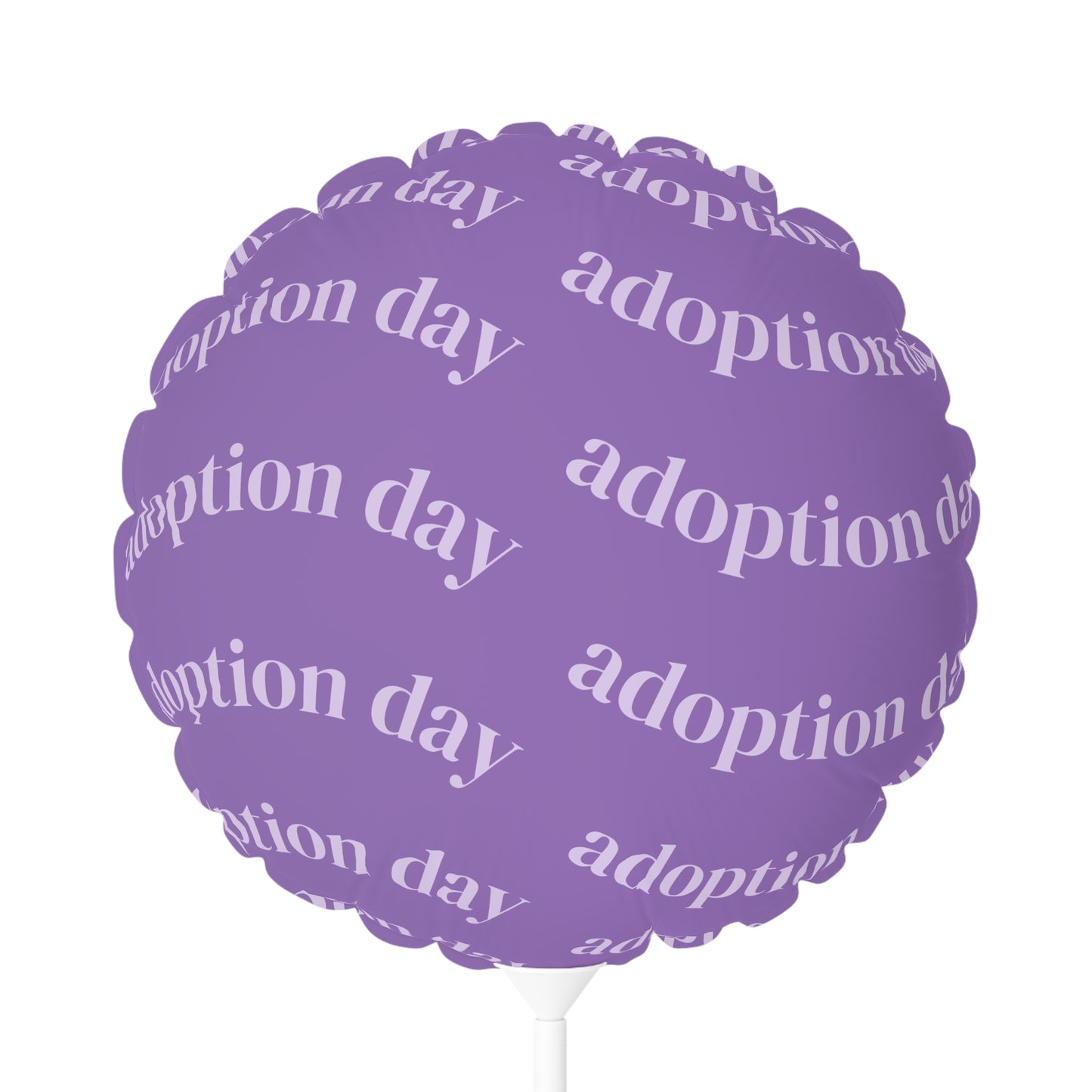 Purple balloon with 'adoption day' text on a white background