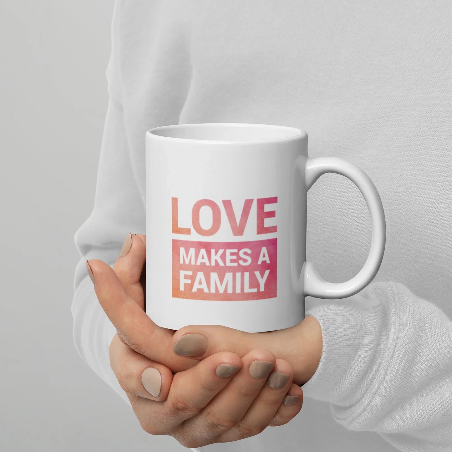 LOVE Makes A Family - pink background - White glossy mug - Adoption Stuff Store
