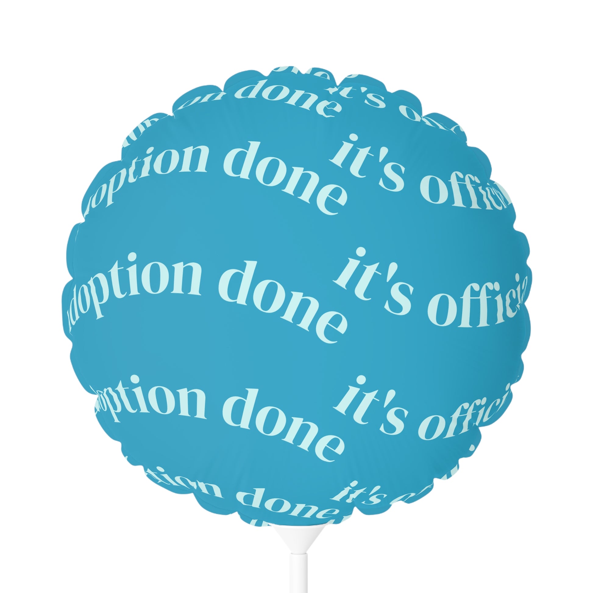 Blue balloon with white text 'adoption done' and 'it's official' on a white background