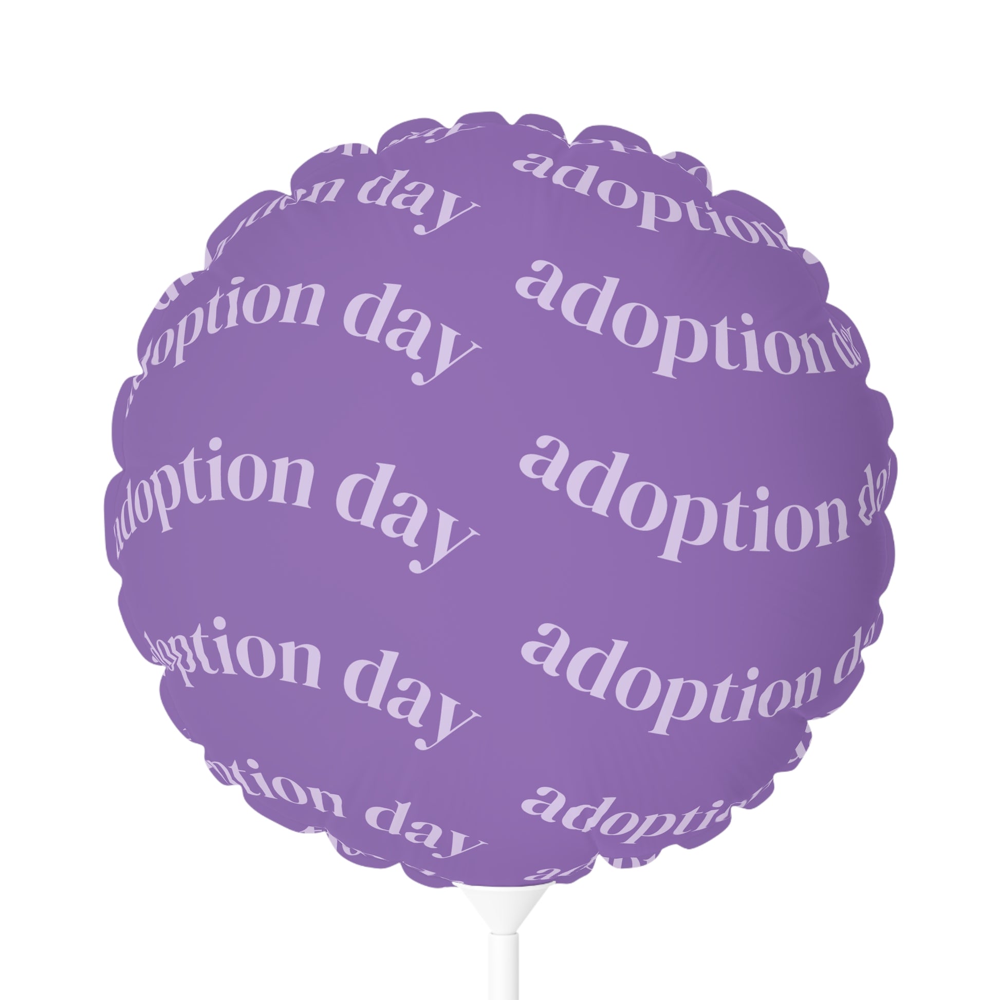 Purple balloon with 'adoption day' text on a white background